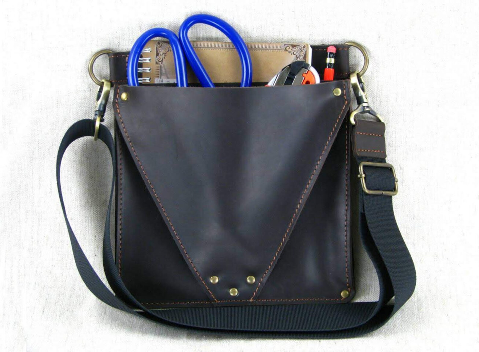 leather tool pouch as a stylish crossbody bag